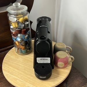 Nespresso Machine with the milk frother. (Coffee seen in photo included)